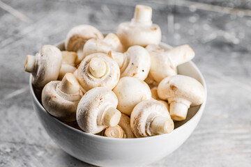 Full bowl with mushrooms on the table. 