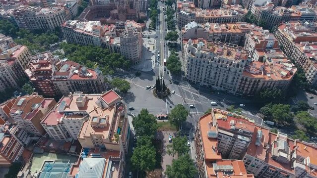 Aerial view of Barcelona Eixample residential district and old town narrow streets, gothic quarter at sunrise. Catalonia, Spain