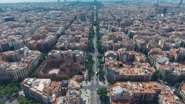 Aerial view of Barcelona Eixample residential district and old town narrow streets, gothic quarter at sunrise. Catalonia, Spain