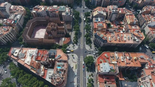 Aerial view of Barcelona Eixample residential district and old town narrow streets, gothic quarter at sunrise. Catalonia, Spain