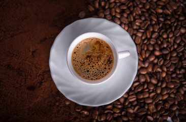 cup of coffee with beans