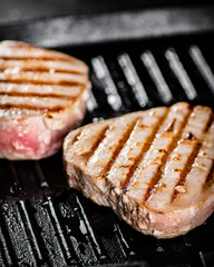 Tuna steak in a grill pan. 