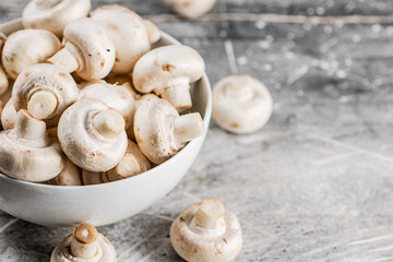 Full bowl with mushrooms on the table. 