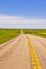 Fototapeta na wymiar Prairie highway in Alberta, Canada