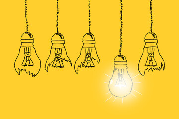Set of light bulbs hand drawn on a yellow background. Concept of unique thinking. Idea concept. Good and bad ideas.