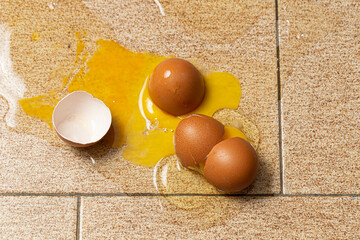 eggs and flour, Broken eggs on floor, yolk spilled, macro image