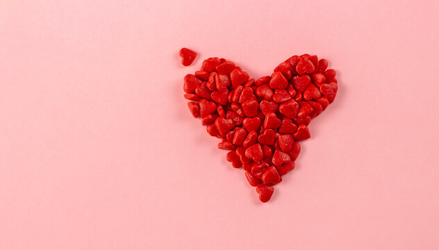 Valentine background. Valentine's day concept. Red heart on a pink background. Banner