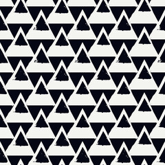 Paint brush triangles ornament. Seamless pattern. Hand drawn geometrical backdrop. Triangular shapes wallpaper. Geometric background. Ethnic motif. Tribal digital paper. Textile print. Vector work