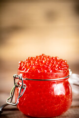 A full can of red caviar.