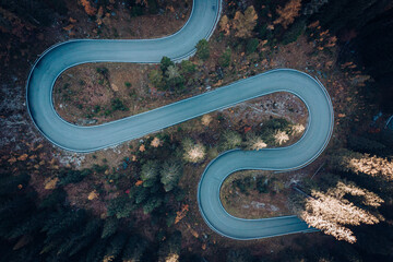 Aerial view of curved asphalt road on the mountain