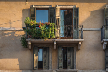 Fototapeta na wymiar vintage house windows and balcony