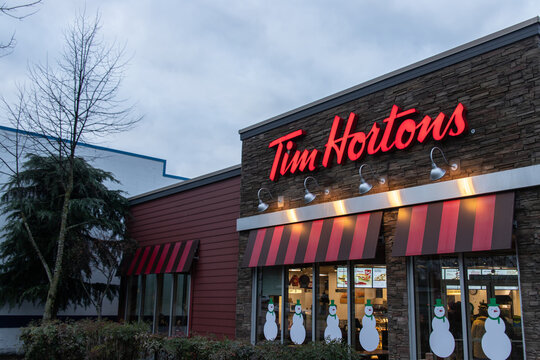 Vancouver, CANADA - Jan 1 2023 : Store sign of Tim Hortons. Tim Hortons Inc. is a Toronto based Canadian coffeehouse and restaurant chain. It is Canada's largest quick-service restaurant chain