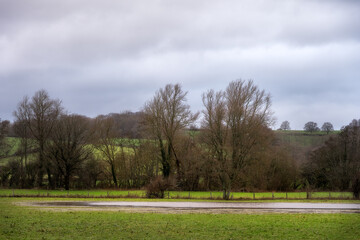 Flooded field on a winter day in Wealden, East Sussex, England