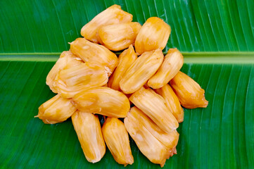 Jackfruits on the banana leaf. Selective focus.