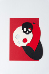 paper skull cutouts on paper shapes