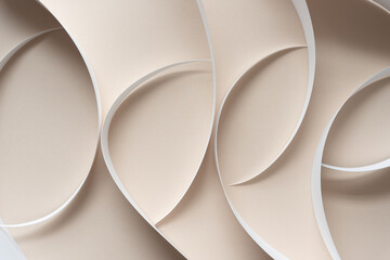 curled paper stripes arranged on blank beige paper with light and dark effect