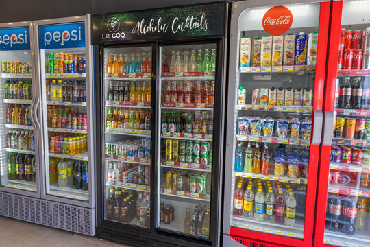 Close-up view of soft drinks and beer in cold stores of store in Greece. Rhodes. Greece. 