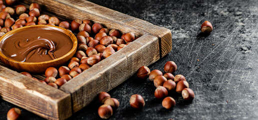Hazelnut butter on a wooden tray. 
