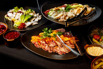 Culinary Buffet - breakfast in hotel, various dishes and snacks on the table.
