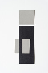 gray squares and rectangles on blank paper