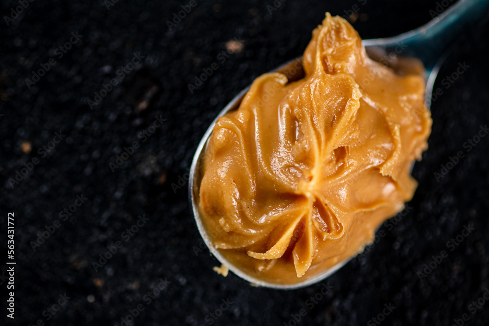 Wall mural A spoonful full of peanut butter. 