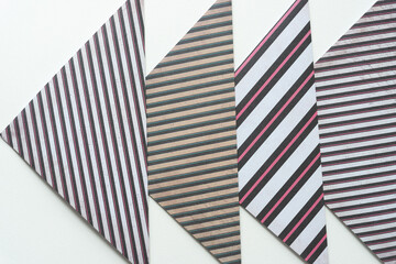 folded scrapbook paper with decorative striped patterns on blank paper