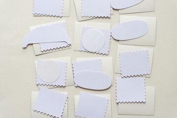 set of paper shapes on blank paper