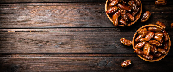 Fresh dates in two plates. 