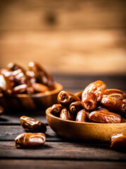 Fresh dates in two plates. 