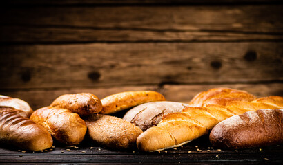 Different types of fresh crispy bread. 