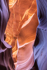 Details of the sandstone formations of Antelope canyon in Arizona with various hues of colors.