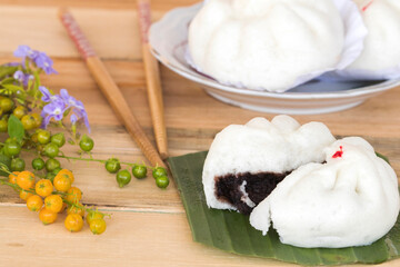 steamed dumpling fresh healthy foods with purple flowers arrangement flat lay styel on background wooden
