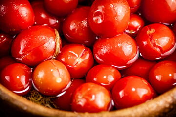 Ripe tomatoes for marinating in a plate. 