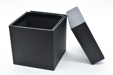 black paper box on white background, packaging industry