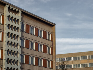 Prefabricated building facades in East Germany. Old abandoned dwelling houses with a lot of...