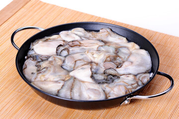 Fresh opened oyster on white background