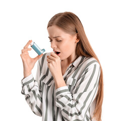 Sick young woman with inhaler on white background