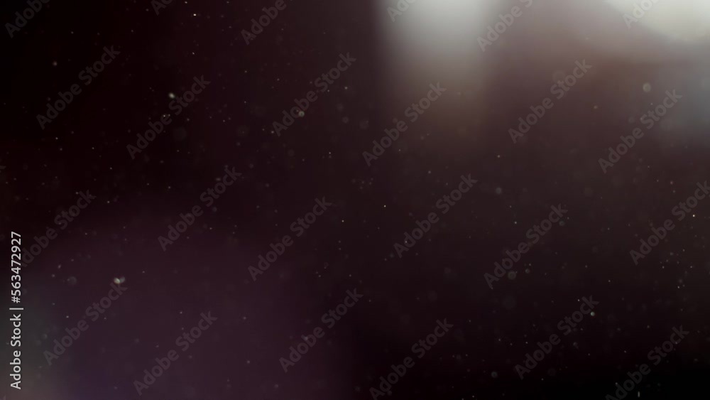 Wall mural abstract background with animation of flying and flickering particles as bokeh of light. animation o