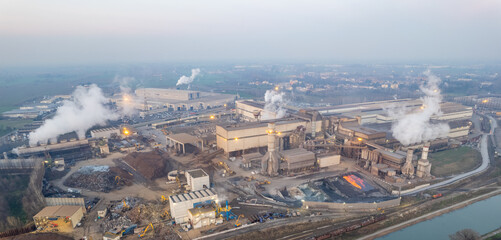 Cremona, Italy - January 2022 Drone aerial view of Arvedi steel plant, industrial zone in...