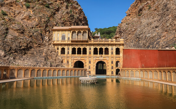 Exterior view of Historic Hindu temple called Galta ji temple is a prehistoric Hindu pilgrimage site located near Jaipur city in India.