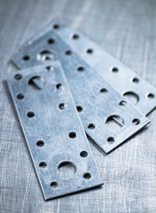 Metal plates for fastening wood. 