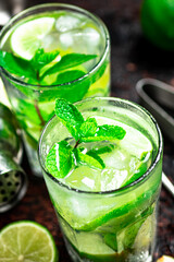Mojito with a sprig of mint and ice. 