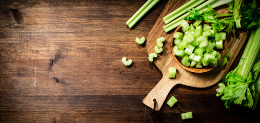 Sliced fresh celery on a cutting board. 