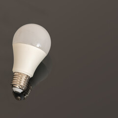 Single led bulb on dark background