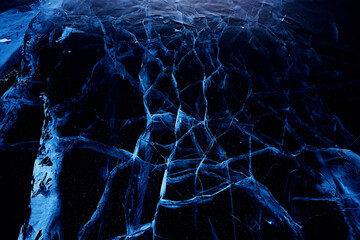 ice texture cracks baikal, abstract background winter ice transparent blue
