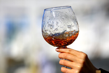 a glass of port wine in hand, portugal drink alcohol
