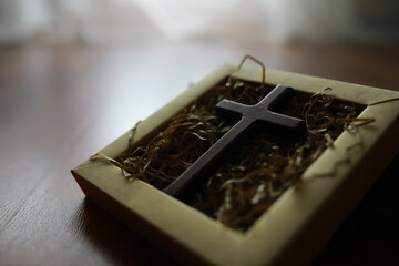 The cross of God in the rays of the sun. Background of religions