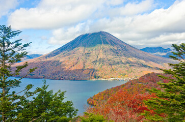 Fototapeta premium Lake Chuzenji and Mt. Nantai in Autumn.