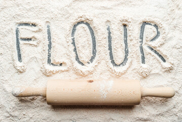 Flour and rolling pin, top view