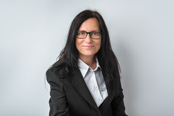 Elegant businesswoman on white background.